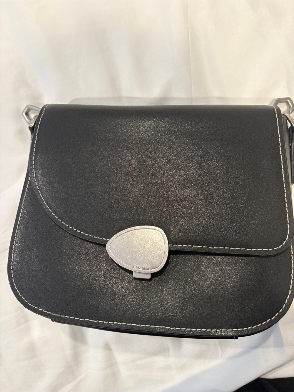 Cariuma Black Leather Crossbody with White Stitching and Silver Clasp